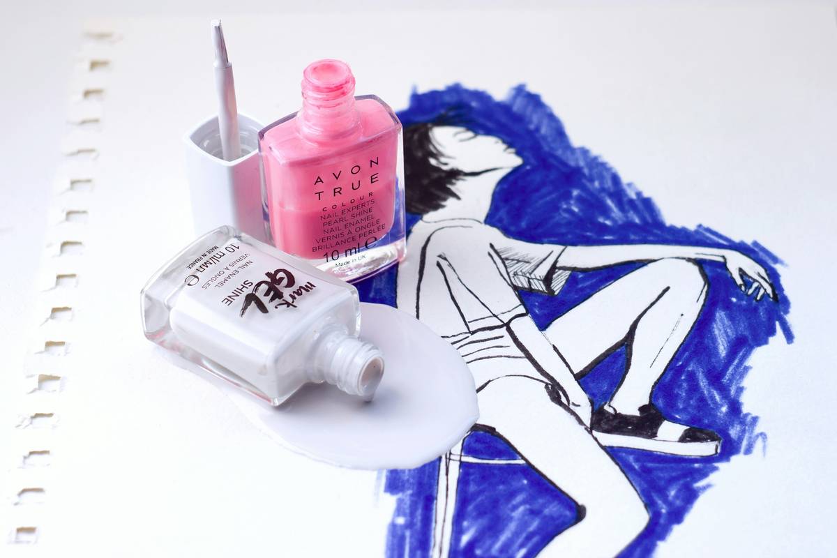 Close-up of nail foundation product bonding to natural nail structure for lasting wear